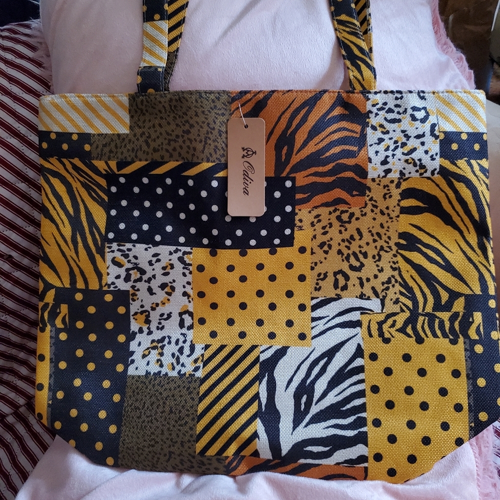 Designer tote zipper closure open cargo design